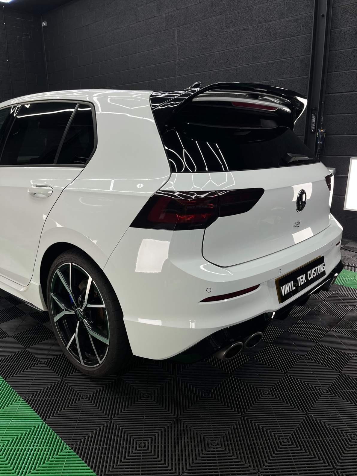 white golf with tinted windows and tinted taillights in Leeds